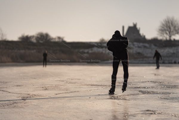 Schaatsers op het ijs